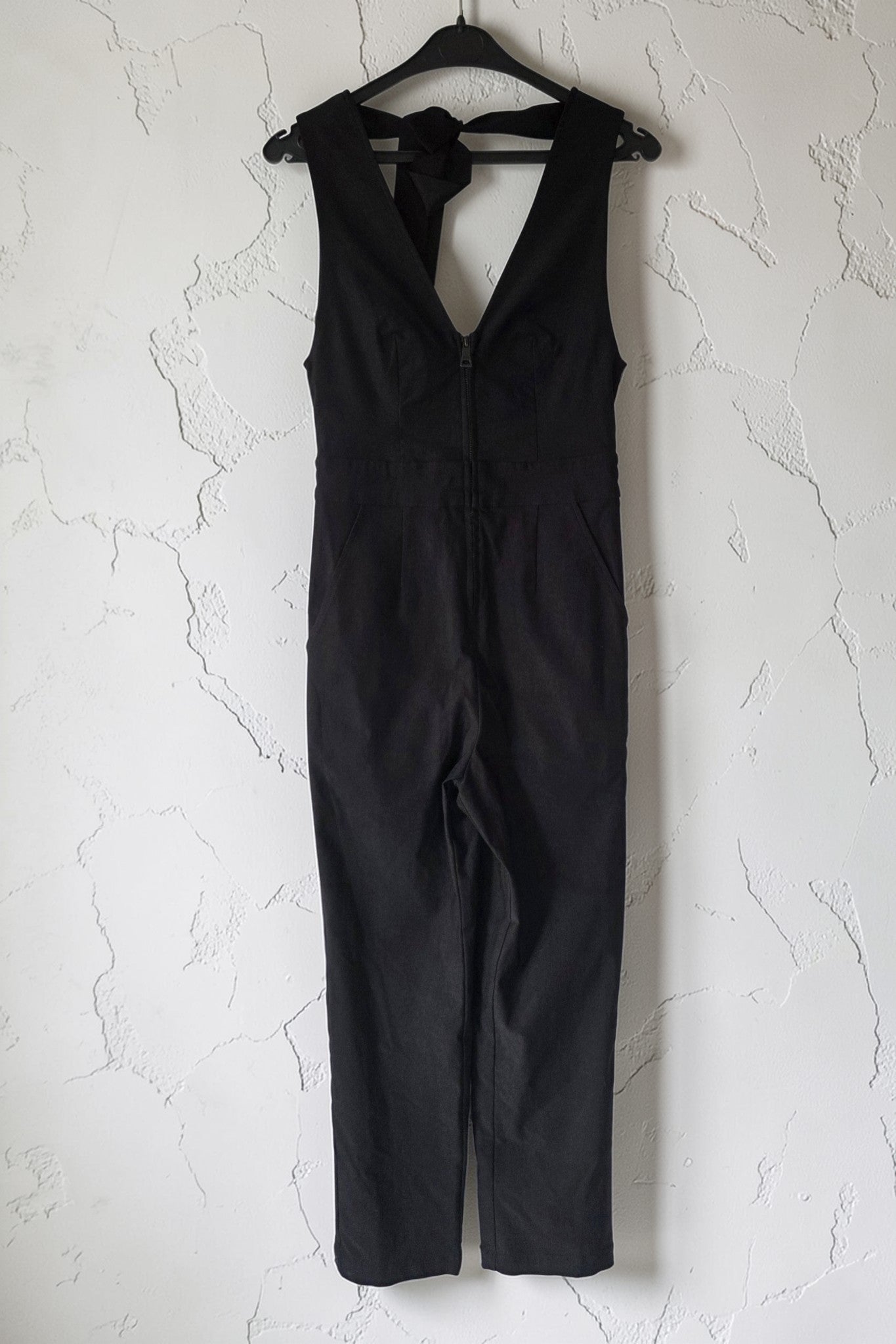 Rivet Utility v hals open rug mouwloze jumpsuit stretch zwart S tweedehands dames designer