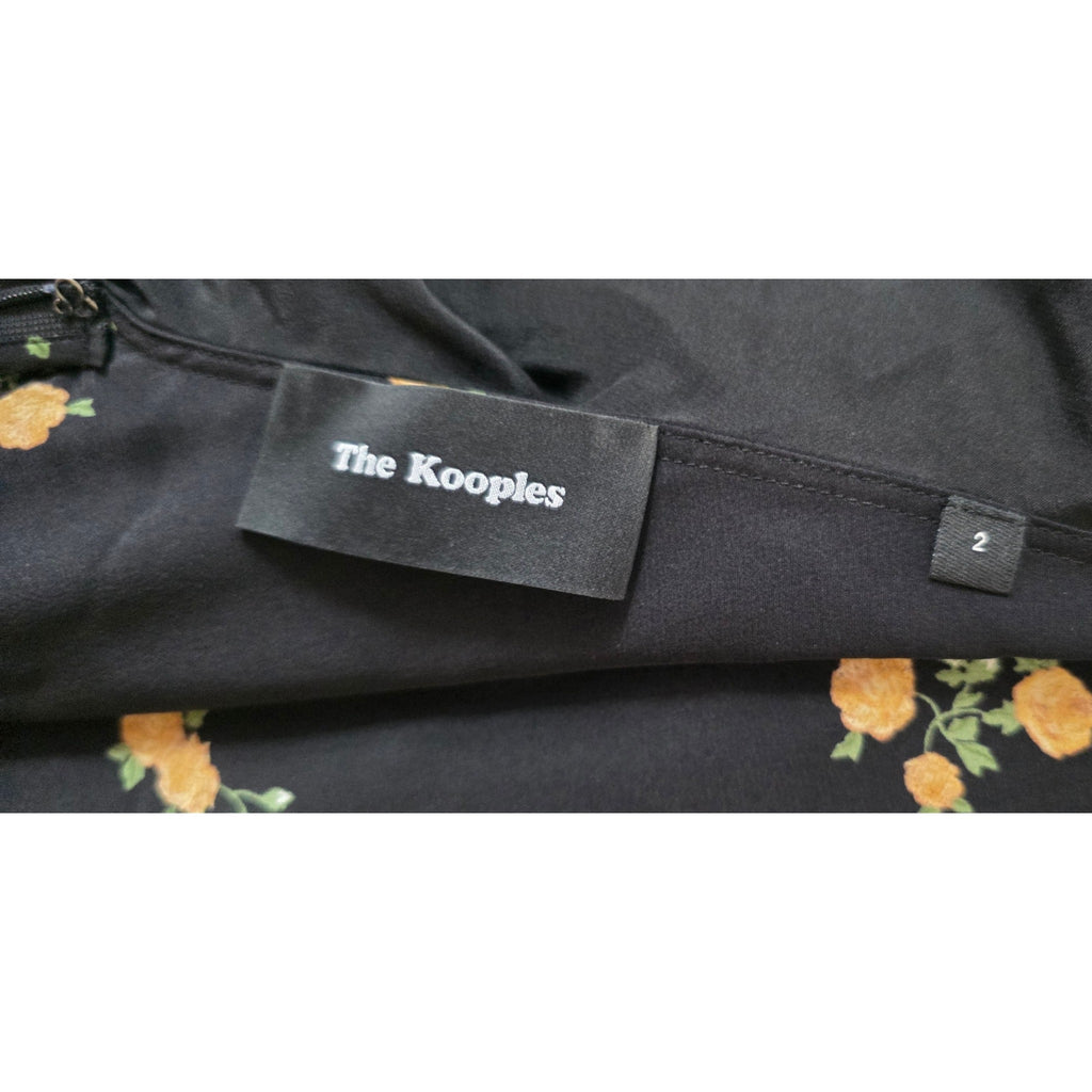 The Kooples mouwloze ruches jumpsuit zwart bloemen zijde pre-loved designer tweedehands  enkellengte