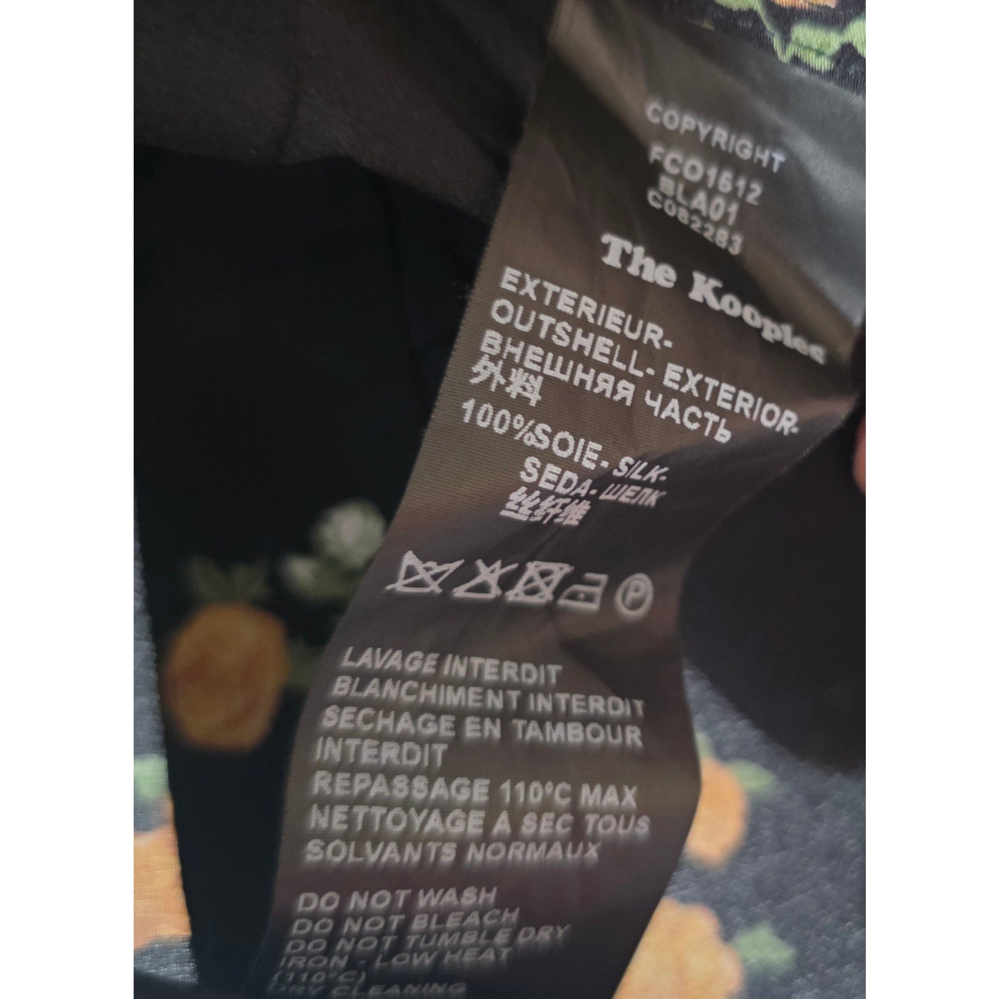 The Kooples mouwloze ruches jumpsuit zwart bloemen zijde pre-loved designer tweedehands  enkellengte